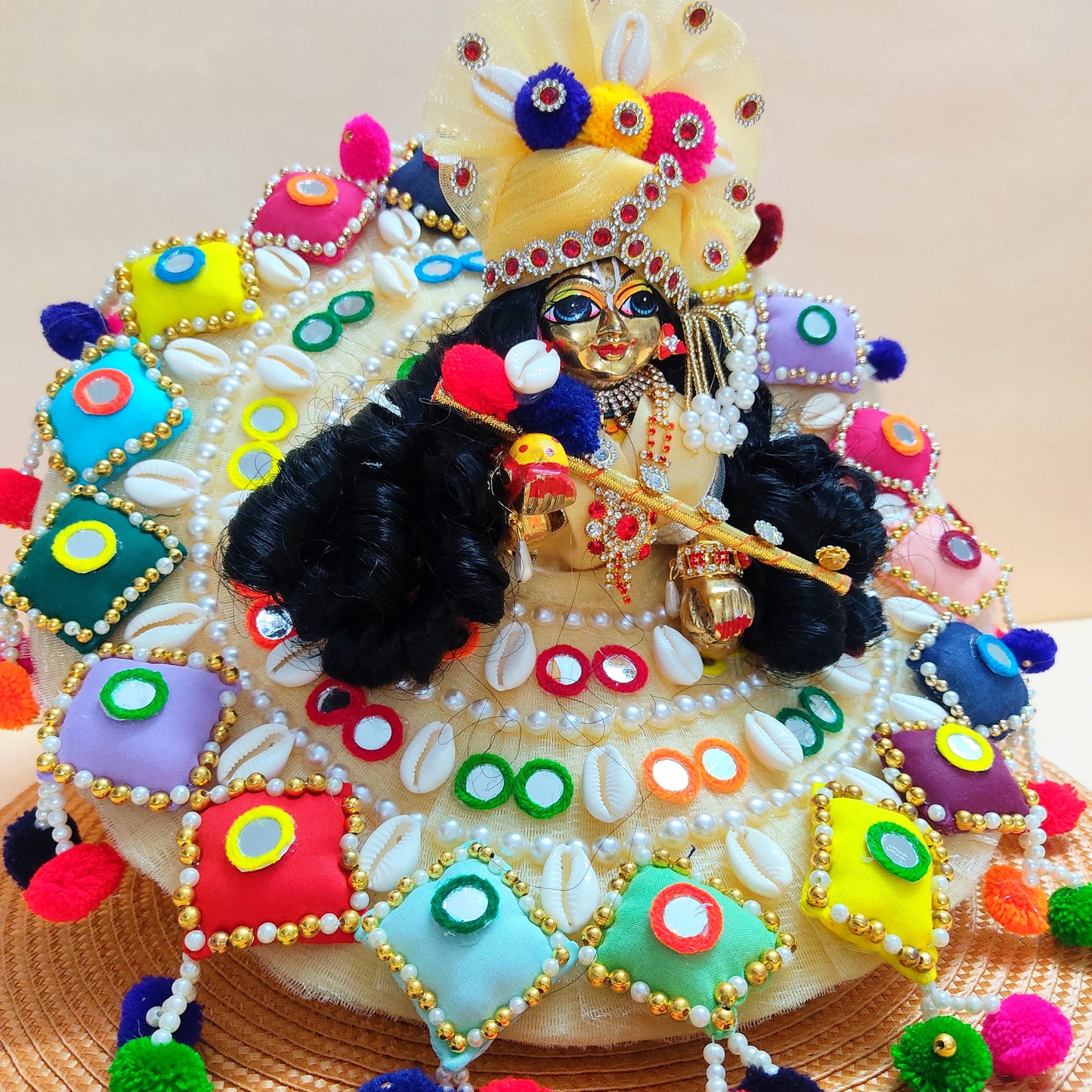 Colorful Designer Kanha Ji Dress – 3D Handmade Patches, Cowrie Beads, Mirror Work, Pom-Poms with Matching Mukut & Full Shringar Set