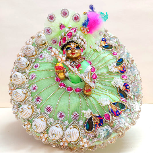 Diwali Special Green Laddu Gopal Dress with 3D Pearl Balls, Zari Peacock Patches & Diamond Chain Work with Matching Mukut, Pataka Set, Bansuri & A Surprise Gift.