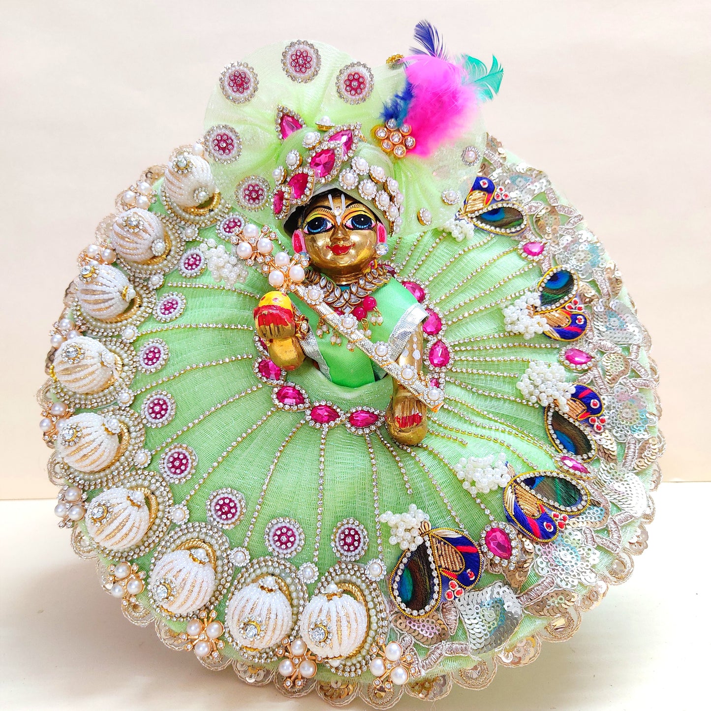 Diwali Special Green Laddu Gopal Dress with 3D Pearl Balls, Zari Peacock Patches & Diamond Chain Work with Matching Mukut, Pataka Set, Bansuri & A Surprise Gift.