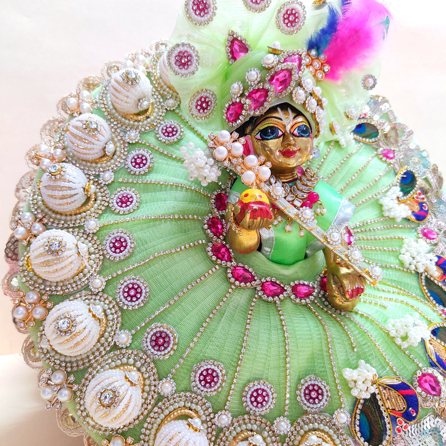 Diwali Special Green Laddu Gopal Dress with 3D Pearl Balls, Zari Peacock Patches & Diamond Chain Work with Matching Mukut, Pataka Set, Bansuri & A Surprise Gift.