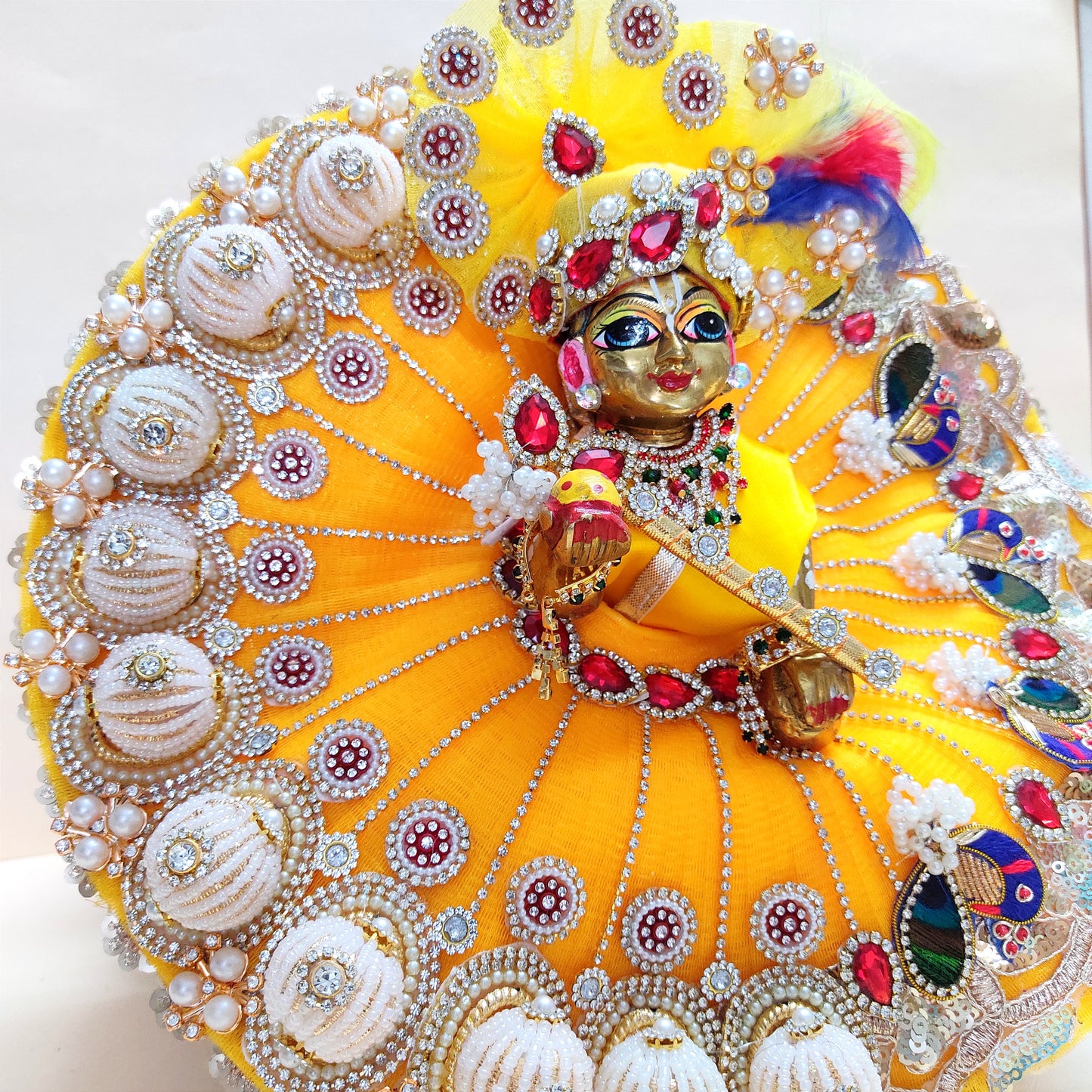 Diwali Special Yellow Laddu Gopal Poshak with 3D Pearl Balls, Zari Peacock Patches & Diamond Chain Work with Matching Mukut, Pataka Set, Bansuri & A Surprise Gift.