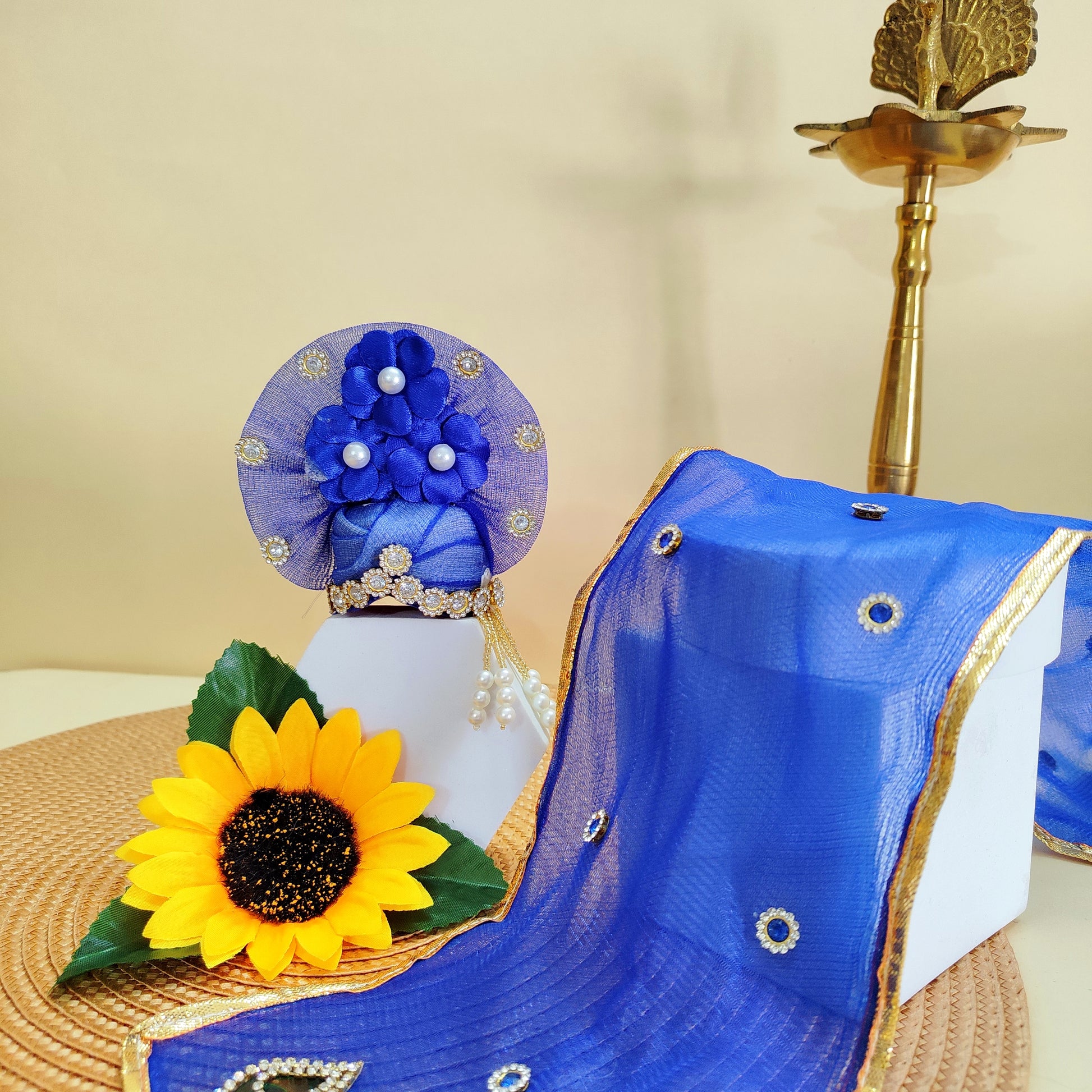 Matching mukut set with flower dress for idols