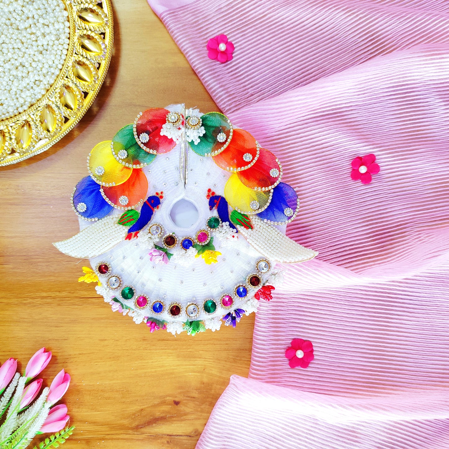 Handmade festive peacock outfit for Gopal ji.